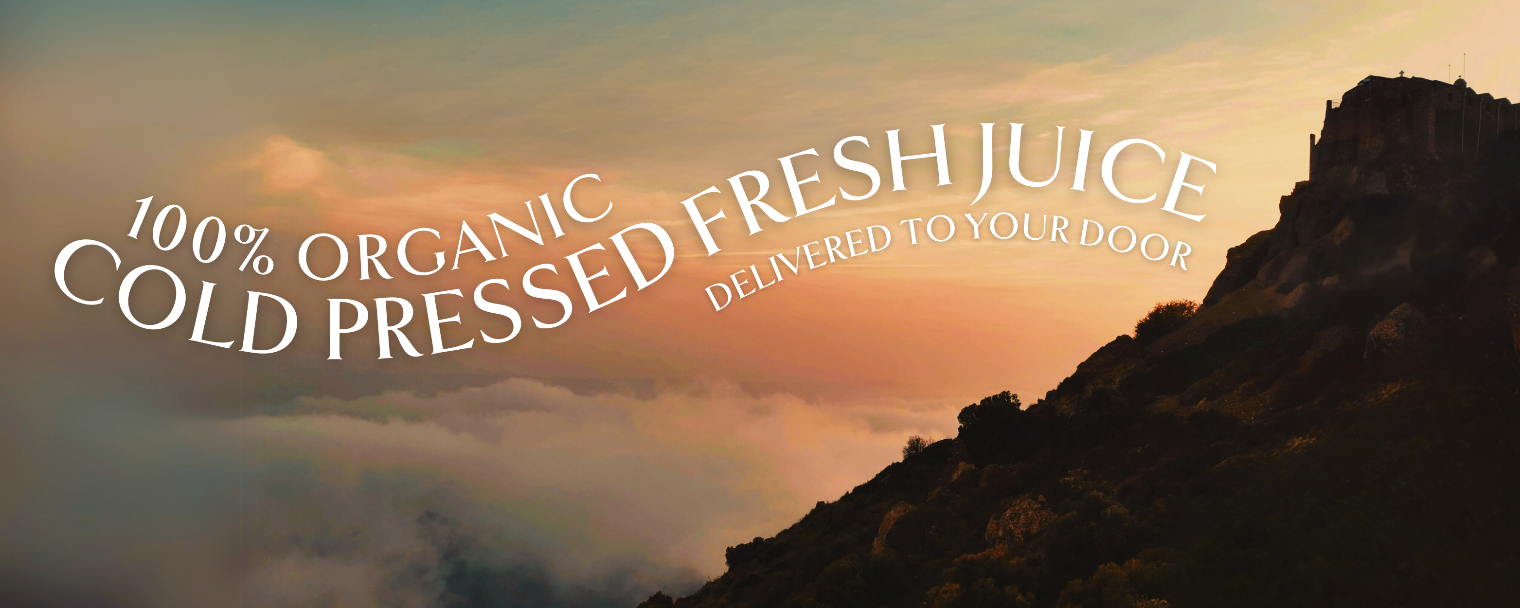 A mountain landscape above the clouds with text overlay: "100% Organic Cold-Pressed Fresh Juice Delivered to Your Door" 